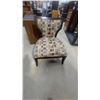 Image 1 : Armless Accent Chair with Geometric Upholstery in Blue, Brown, and Tan Tones