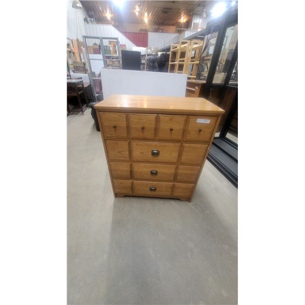 Oak Chest of Drawers with Twelve Assorted Drawers and Bronze-Tone Hardware 40 x 34 x 18"