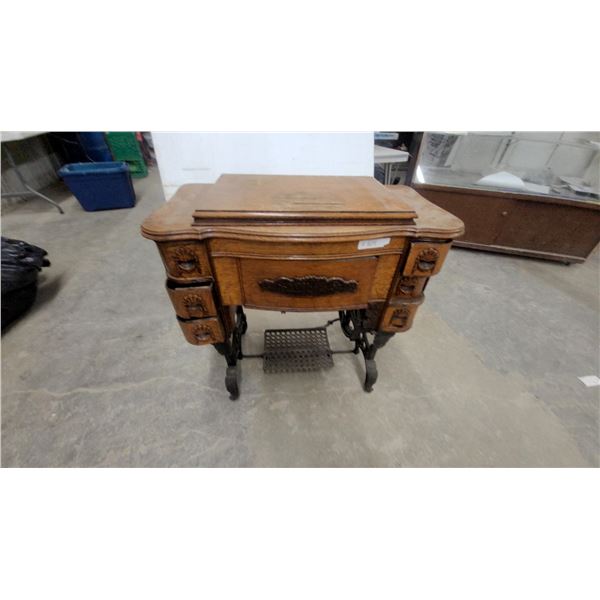 White Treadle Sewing Machine in Ornate Carved Oak Cabinet with Cast Iron Base
