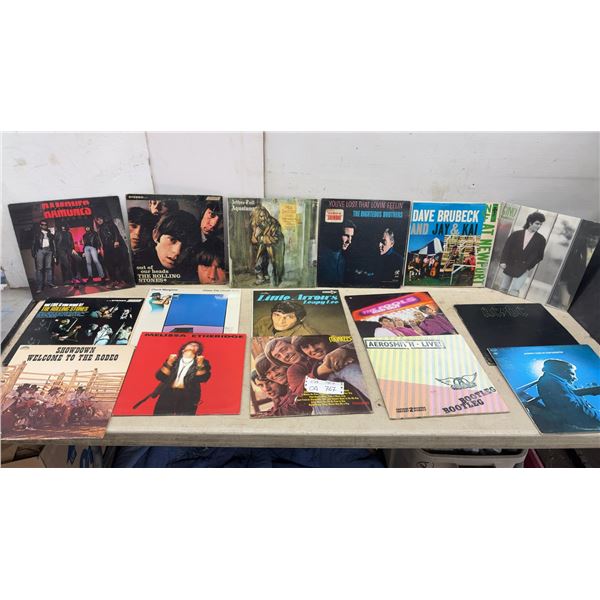 Collection of 17 Vinyl LP Records: Ramones, Rolling Stones, AC/DC, Aerosmith, and More