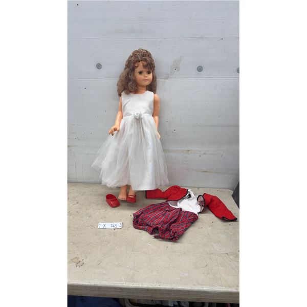 Vintage Large Plastic Girl 32" Tall Doll with Curly Brown Hair, White Dress, and Extra Clothing