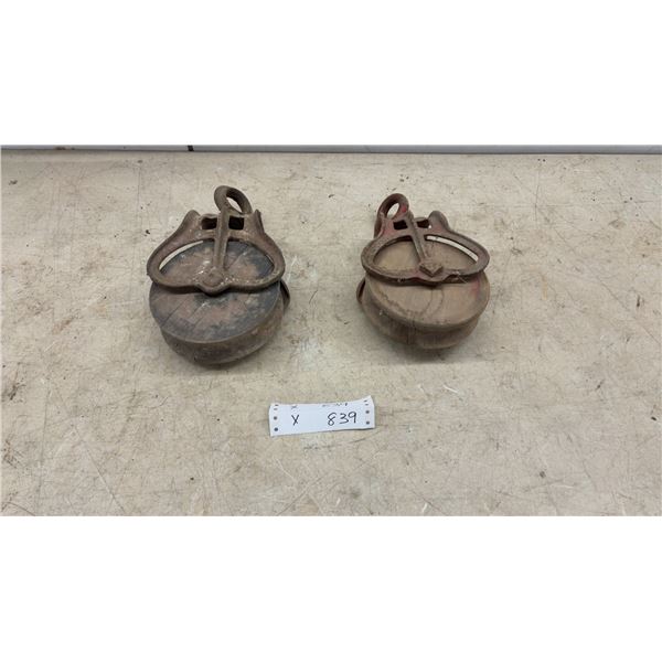 Pair of Vintage Cast Iron and Wood Barn Pulleys Including Simons Manufacturing Co.