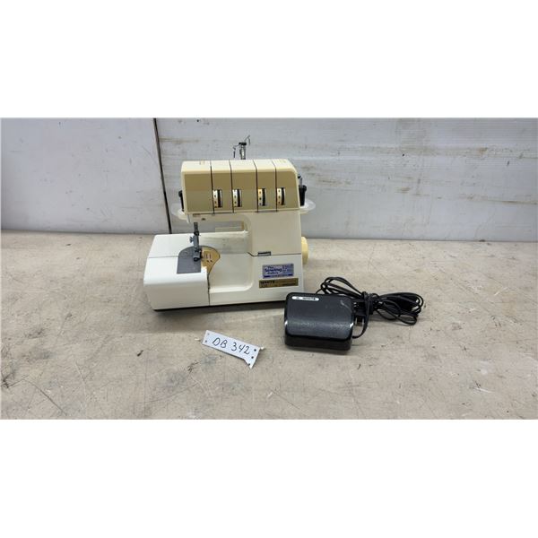 White Super Lock 228 by Jaguar Four-Thread Serger with Foot Pedal