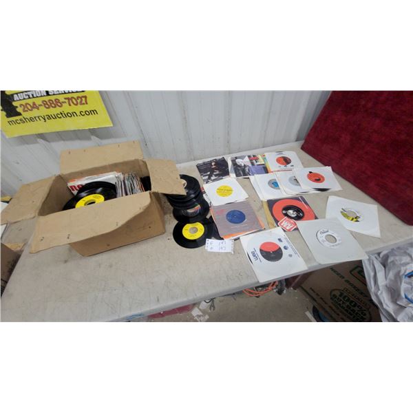 Collection of 45 RPM Vinyl Records with Various Labels Including Columbia, RCA, and More