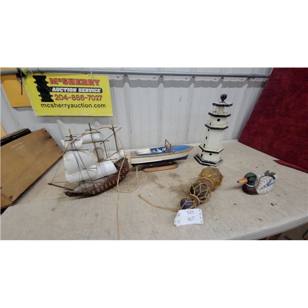 Nautical Décor Lot: Wooden Galleon Ship Model, Lighthouse, Boat Model, Duck Figurine, and More