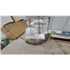 Image 4 : Nautical Décor Lot: Wooden Galleon Ship Model, Lighthouse, Boat Model, Duck Figurine, and More