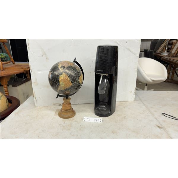 SodaStream Source Sparkling Water Maker in Black and Decorative Globe on Wood Stand