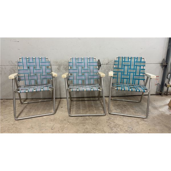 Set of Three Vintage Aluminum Folding Lawn Chairs with Woven Webbing and Plastic Armrests