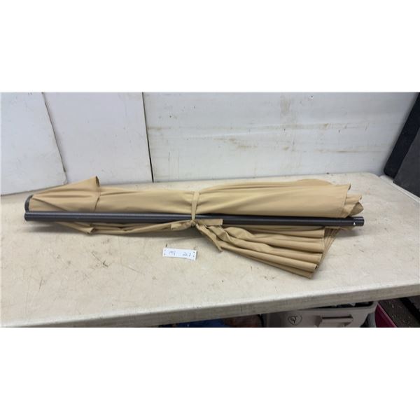 Tan Patio Umbrella with Bronze Two-Piece Metal Pole