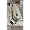 Image 1 : Four Left Hockey Sticks & Goalie Stick, Sher-Wood 3300, Easton Reflex, Sher-Wood 7000, Fischer GX7
