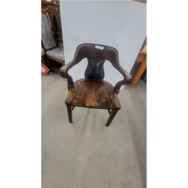 Barrel-Style Armchair with Curved Back, Contoured Wood Seat, and Upholstered Lumbar Pad