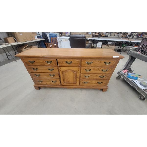 Oak 11-Drawer Dresser with Center Cabinet and Brass Bail Pull Hardware 34 x 68 x 19"