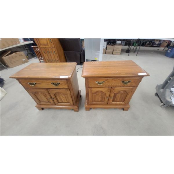 Pair of Oak Two-Drawer Nightstands with Brass Bail Pulls and Carved Panel Fronts 29 x 30 x 17"