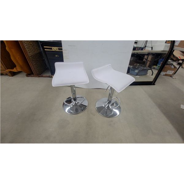 Pair of White Faux Leather Adjustable Backless Bar Stools with Chrome Pedestal Bases