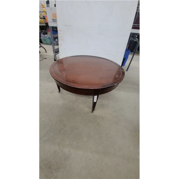 Round Dark Wood Coffee Table with Tapered Legs and Casters 15" Hgt.×34" Diameter