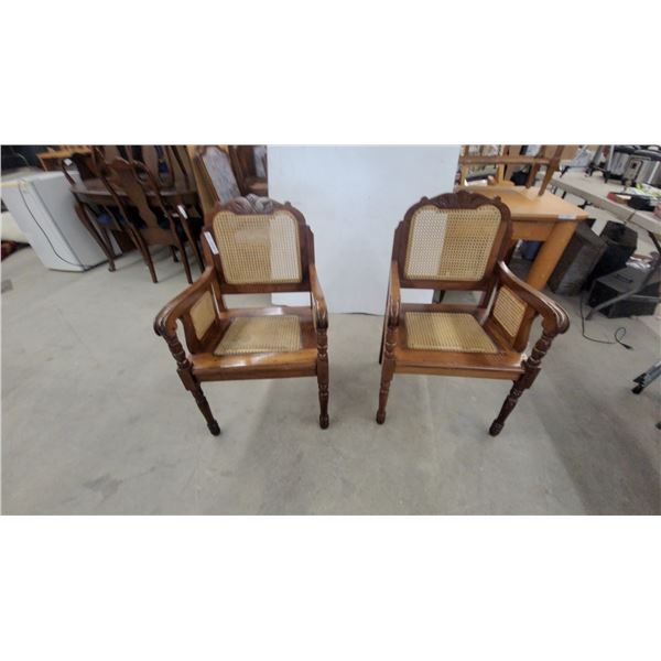 Pair of Colonial Revival Carved Wood Armchairs with Cane Seat, Back, and Side Panels