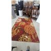 Image 1 : Red Floral Area Rug with Orange, Yellow, Cream, and Brown Blooms, Approximately 78 x 112"