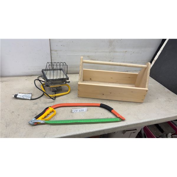 Work Light, Wooden Tool Caddy, and Bow Saw