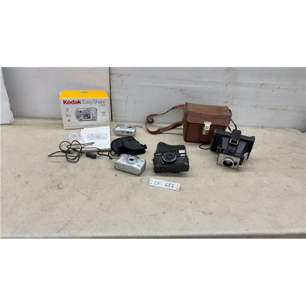 Kodak EasyShare V7300, Minolta Hi-Matic AF2, Polaroid Super Colorpack and More