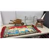 Image 1 : Wooden Ladybug Step Stool, Decorative Wheelbarrow, Metal Rack, and Tapestry Runner