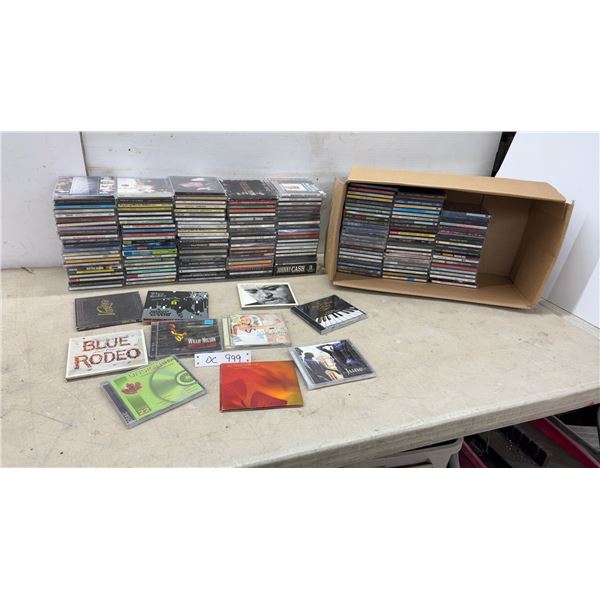 Large Collection of Music CDs Including Johnny Cash, Willie Nelson, Blue Rodeo, and More