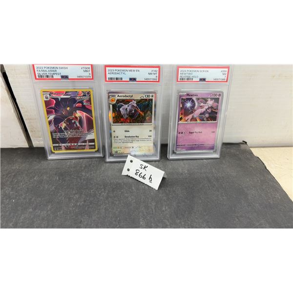Three PSA-Graded Pokémon Cards: Malamar Mint 9, Aerodactyl NM-MT 8, Mewtwo NM 7