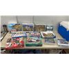 Image 1 : Collection of 1000-Piece Jigsaw Puzzles, Eurographics, Ravensburger, White Mountain, and More.