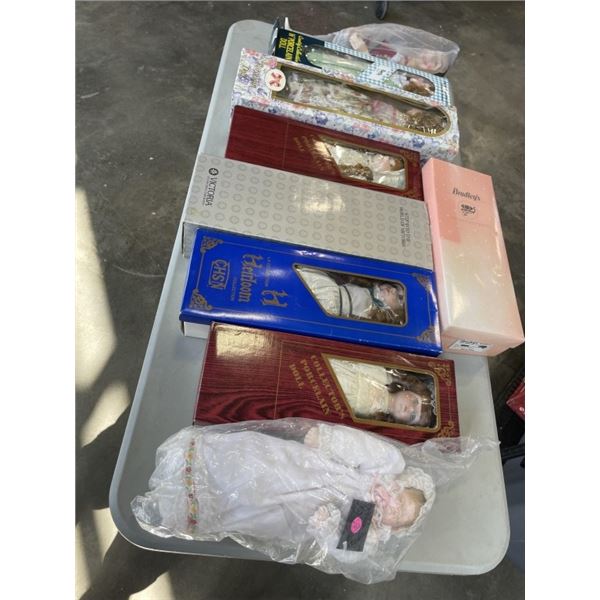 9 VINTAGE DOLLS