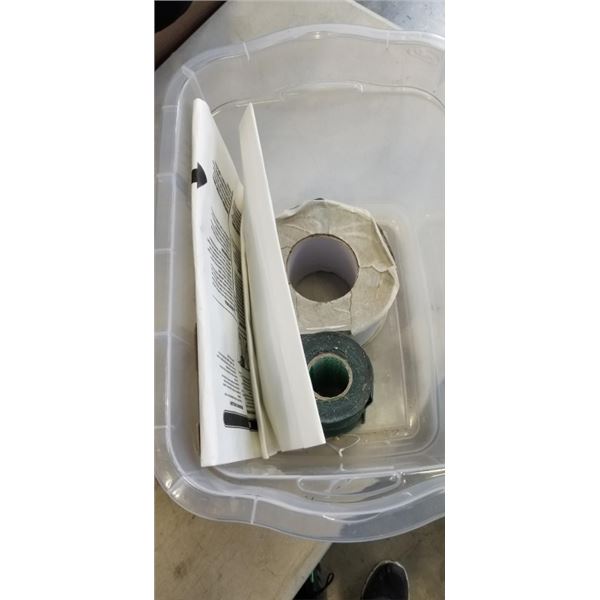 2 ROLLS OR ARTIFICIAL TURF TAPE IN SMALL TOTE WITH LID