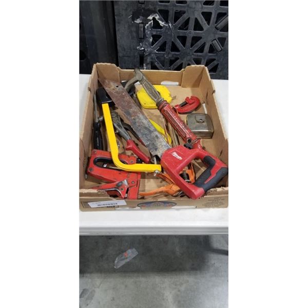 TRAY OF TOOLS INCLUDING 2 HAND SAWS, STAPLER, 2 TAPE MEASURER RIVETER, NAIL PULLER