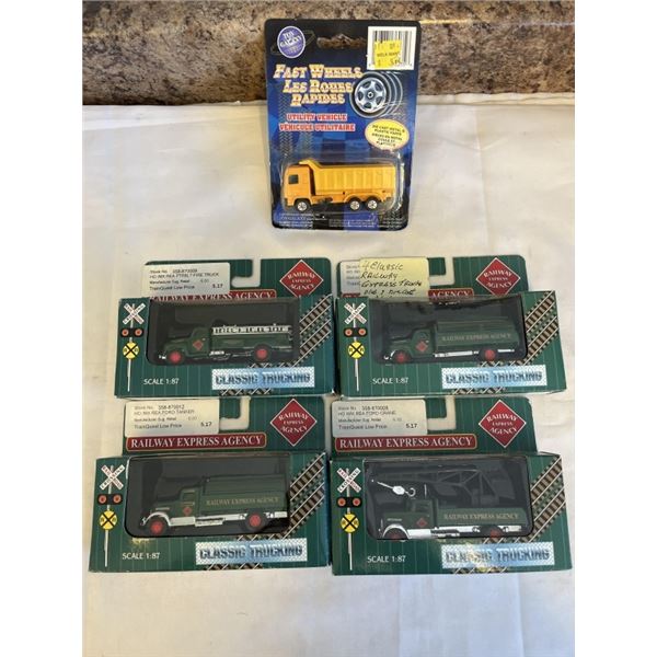4 CLASSIC RAILWAY EXPRESS TRUCKS AND 1 DIECAST METAL TRUCK