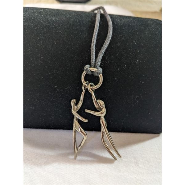 SILVER TONE PENDANT W/ BLACK CORD NECKLACE