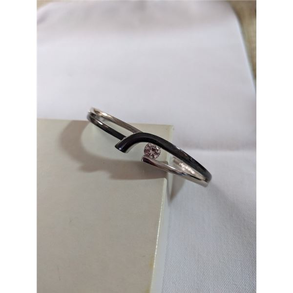 SILVER TONE HINGED BRACELET MARKED BUTLER
