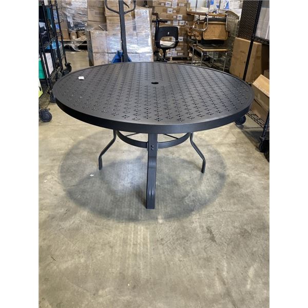 METAL PATIO TABLE WITH UMBRELLA INSERT.  4 FEET WIDE
