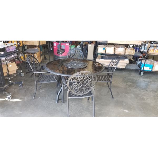 LAZY SUSAN LARGE PATIO TABLE WITH GLASS TOP,  AND 4 METAL PATIO CHAIRS