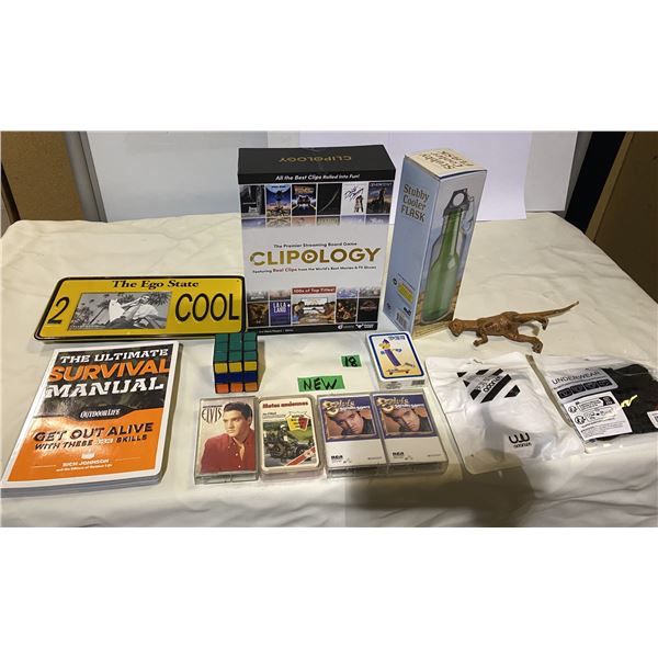 Clipology board game, 4 Elvis cassette tapes, cooler flask, survival manual, rubix cube and more