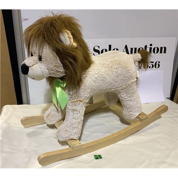 Plush lion rocking horse by Animaladventure