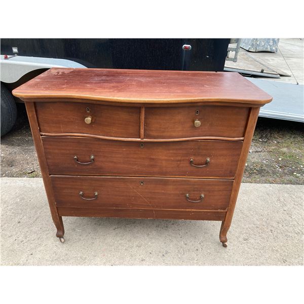 ANTIQUE FOUR DRAWER SERPENTINE FRONT DRESSER