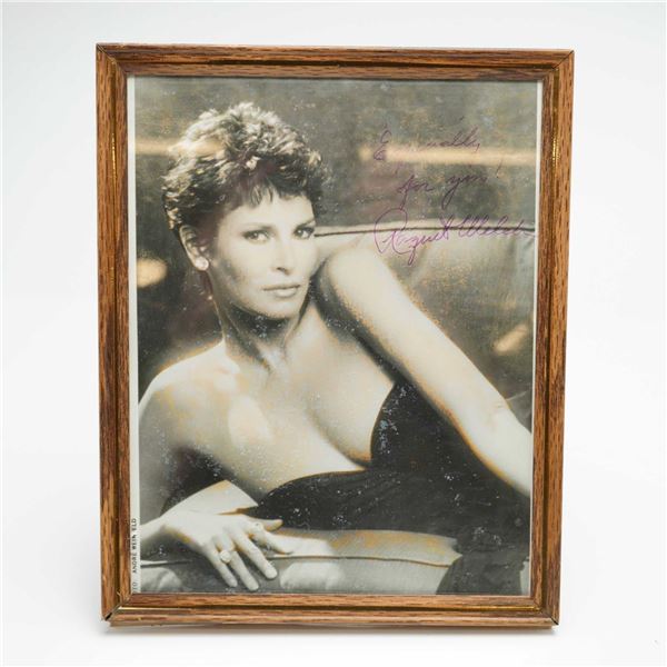 Raquel Welch Autographed Photograph by Andre Weinfeld