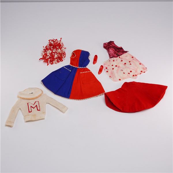 Three Vintage Mattel Barbie Doll Outfits including Fancy Free, Glo Go, and Cheerleader