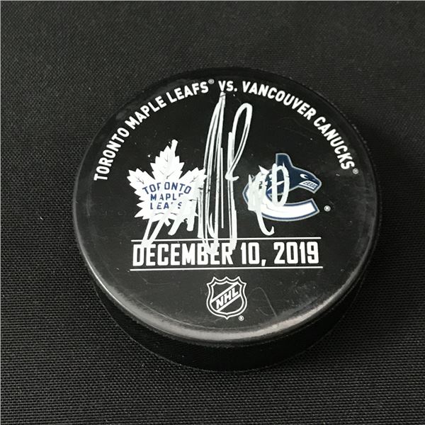 ELIAS PETTERSSON SIGNED PUCK - WWOC COA