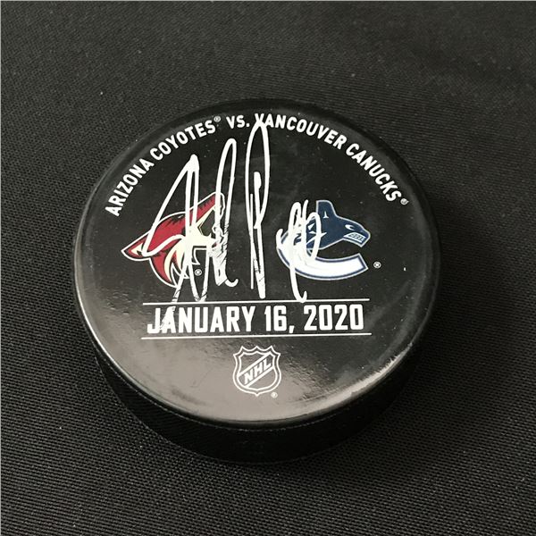 ELIAS PETTERSSON SIGNED PUCK - WWOC COA