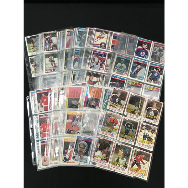 LOT OF 1980'S VINTAGE O PEE CHEE NHL TRADING CARDS IN BINDER SLEEVES