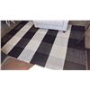 Image 2 : EQ3 FURROW RUG 9' X 5'. HANDWOVEN FROM 100% WOOL. BLACK AND WHITE, RETAIL $500