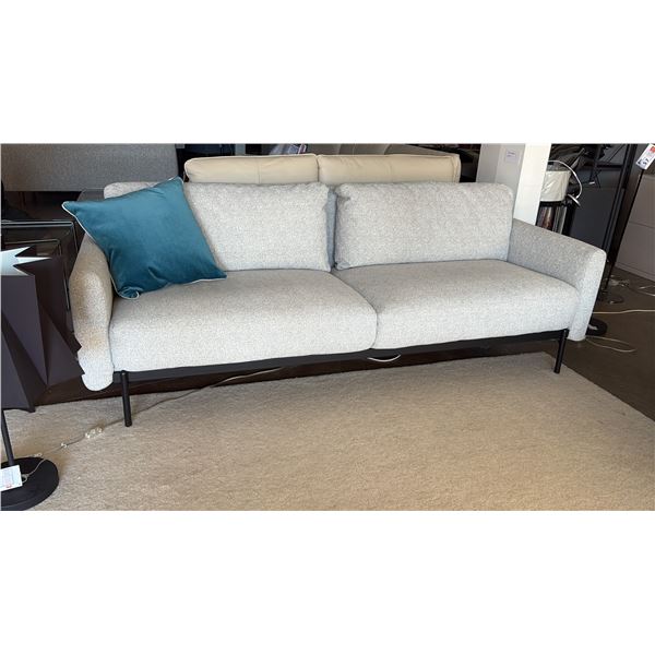 HTL BAXTER SOFA 85" WIDE. PLUSH GREY FABRIC WITH MATTE BLACK METAL LEGS. RETAIL $2500. INC BLUE