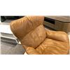Image 2 : EQ3 MADE IN CANADA ARIE LEATHER SWIVEL CHAIR AND OTTOMAN. COACHELLA LANA LEATHER WITH BLACK BASE