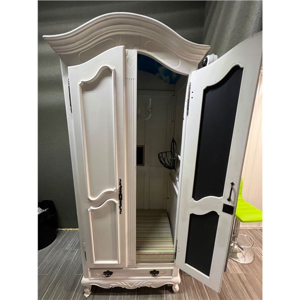 Large Wardrobe converted to a kids reading nook