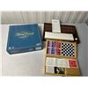 Image 1 : Trivial Pursuit, Rummy(New), assorted games in wooden box, Rummy(New)