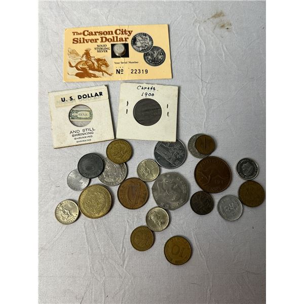 International coins, Carson City silver dollar, shrunken U.S. dollar bill,