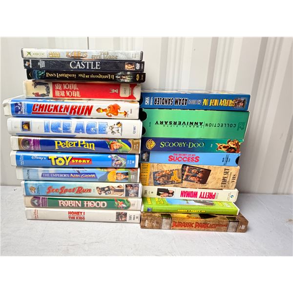 box of family dvd's and VHS tapes